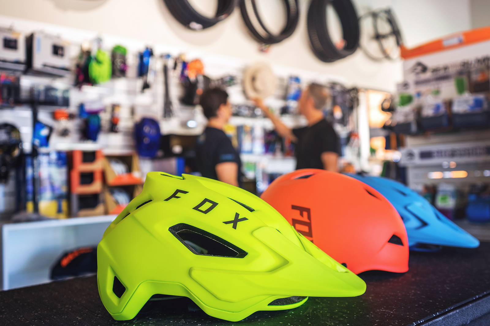 Fox bike helmets in neon and red at Dwellingup gear store