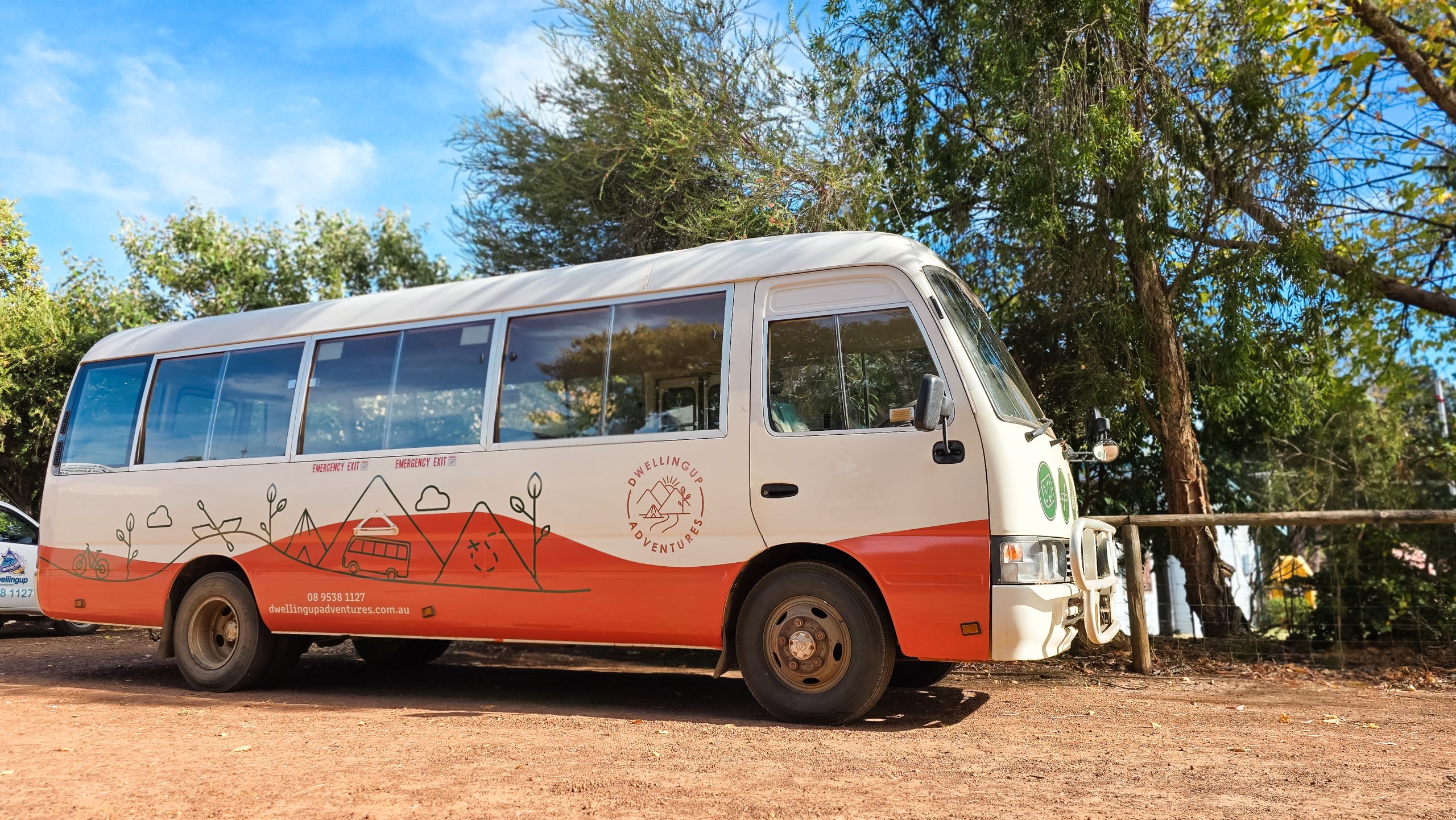 Side view of Dwellingup Adventures bus ready for group transport